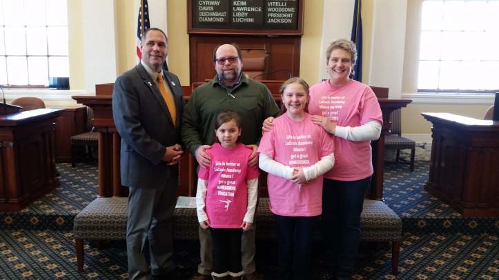 Farrin with LaCroix family.jpg